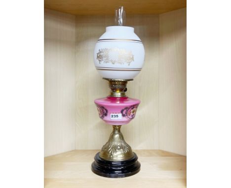 A 19th century glass and brass oil lamp, H. 58cm.