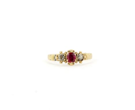 An antique yellow metal (tested 15ct gold) ring set with a square cut ruby and diamonds, (L).