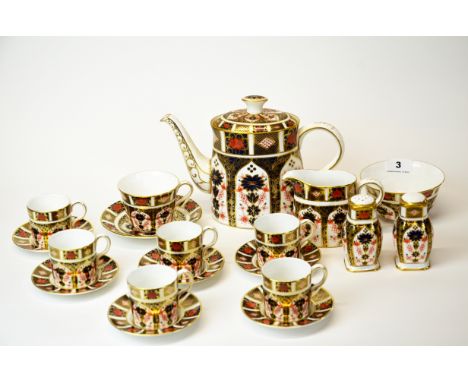 A Royal Crown Derby tea and coffee set comprising; tea pot, sugar bowl, milk jug, one tea cup and saucer, salt and pepper, an