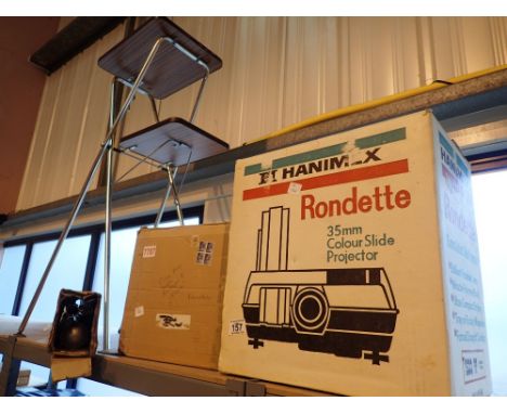 Hanimex Rondetta 35mm colour slide projector and a Cinemax automatic 8+ Super 8 projector and a projector stand and screen