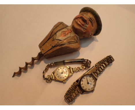Two ladies wristwatches and a German carved corkscrew