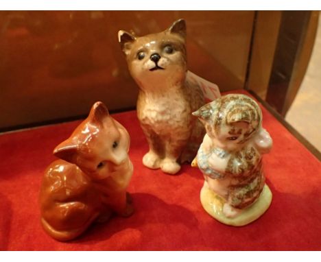 Three ceramic Beswick cats