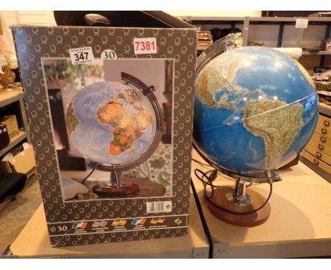 Illuminated 30 cm world globe in original box    CONDITION REPORT:  The electrical items included in this lot have been PAT t