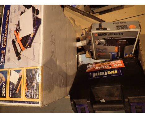 Box of mixed tools boxed cordless drill and an electric tile cutter   CONDITION REPORT:  The electrical items included in thi