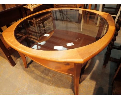 Wooden square coffee table with curved sides and circular glass inset top and wood under shelf 84 x 84 cm 