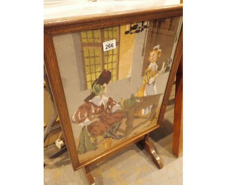 Firescreen table with tapestry picture behind glass