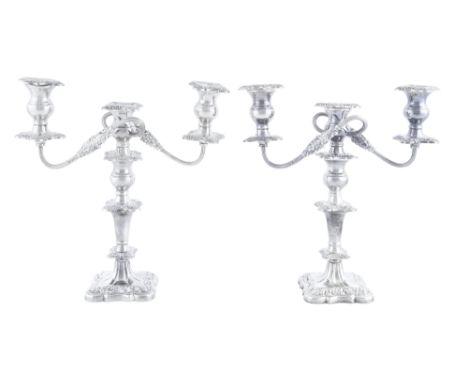 A PAIR OF SILVER THREE LIGHT CANDLEABRA, Sheffield 1938-1939, with foliate cast detachable sconces, and entwined branches, on