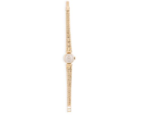 AN 18CT GOLD LADY'S WATCH, the round convex face with baton numerals with milled winder and intricately woven strap of taperi