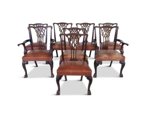 A GOOD SET OF EIGHT MAHOGANY CHIPPENDALE STYLE DINING CHAIRS, 19th Century, with original hide upholstery, on cabriole legs w