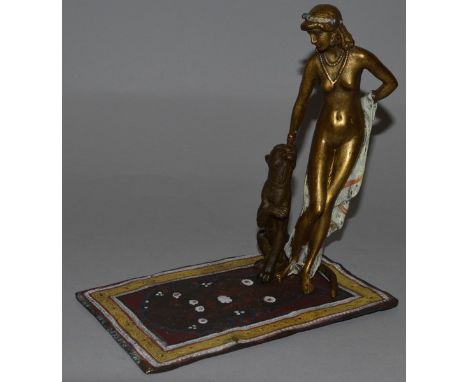 A VIENNA COLD CAST GROUP, “NUDE AND TIGER ON A CARPET” 6ins long.