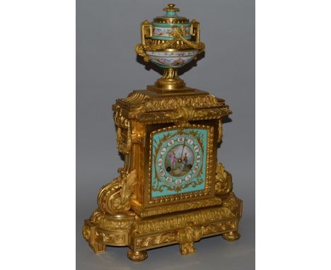 A SUPERB 19TH CENTURY GILT ORMOLU AND PORCELAIN MANTLE CLOCK, the dial in the SEVRES style, pink porcelain painted with lover