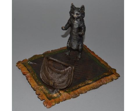 A LARGE VIENNA TYPE COLD CAST GROUP, “CAT ON A RUG” 7.5ins long.