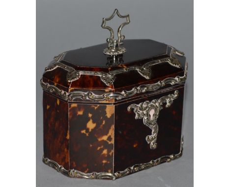 A SUPERB SMALL VICTORIAN SILVER MOUNTED TORTOISESHELL OCTAGONAL SHAPED TEA CADDY with silver handle and mounts, canted sides,