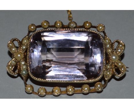 A VICTORIAN AMETHYST AND SEED PEARL BROOCH.