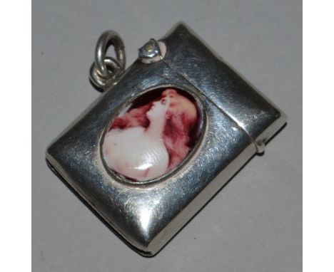 A SMALL PLAIN SILVER VESTA, Birmingham 1901, with an oval portrait of a girl.