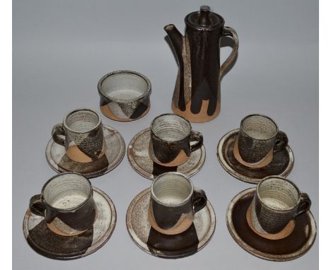 A CORNISH WARE POTTERY TEA SET comprising teapot, sugar bowl, six cups and saucers.