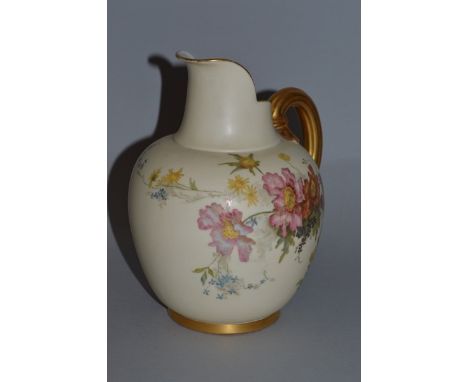 A ROYAL WORCESTER JUG, Pattern No. 1094, painted with flowers with gilt handle 8.5ins high.