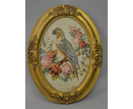 A GOOD 19TH CENTURY BRUSSELS OVAL TAPESTRY PICTURE OF A PARAKEET amidst flowers in a gilt frame. 25ins x 19ins overall.