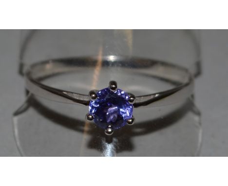 A TANZANITE RING in white gold.