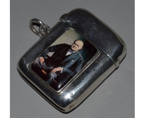 A PLAIN SILVER VESTA, Birmingham 1899, with a portrait of Sir Winston Churchill.