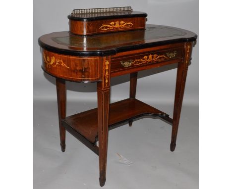 A VICTORIAN EDWARDS & ROBERTS INLAID ROSEWOOD DESK, the top with compartment with brass grill, leather writing surface fitted