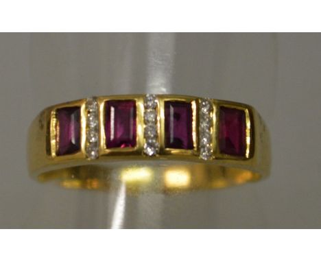 AN 18CT GOLD, RUBY AND DIAMOND HALF HOOP RING.