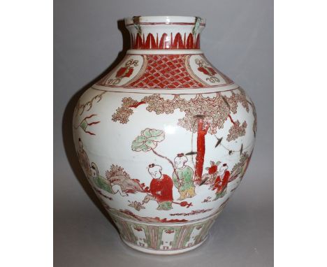 A LARGE MING STYLE WUCAI PORCELAIN VASE, decorated with a continuous scene of boys playing in a garden setting, the base with