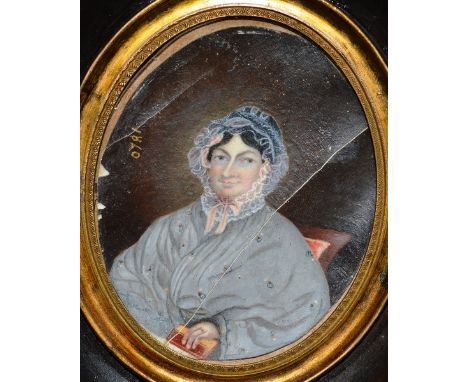 A VICTORIAN OVAL FRAMED PORTRAIT MINIATURE OF AN OLD LADY 3.5ins x 2.5ins.