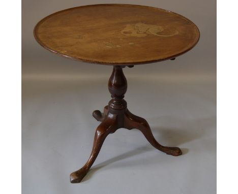 A GEORGE III MAHOGANY CIRCULAR TRAY TILT TOP TRIPOD TABLE with plain top, centre column, tripod legs ending in pad feet. 2ft 