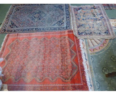 Geometrically patterned carpet to a red ground 132x190 & 2 other rugs 124x198 & 100x126 (both worn)