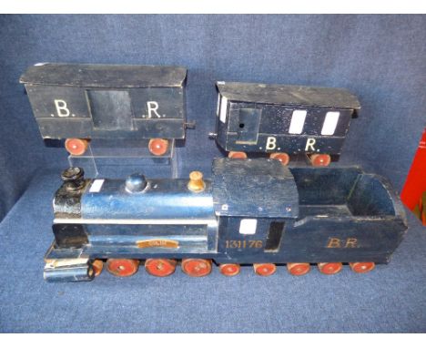Wooden painted toy model of steam engine & carriages