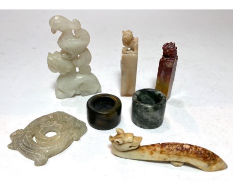 Collection of Chinese hardstone items including: 2 archers thumb rings, sash buckle, pendant etc.&nbsp;&nbsp;Minor chips to s