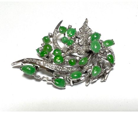 A GREEN JADE & DIAMOND BROOCH - set in white gold, stamped 14ct, 16.3gm gross. -In good condition with no damage or repairs42