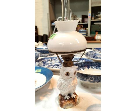 OWL NURSERY LAMP, 19th century porcelain with glass eyes, with brass fittings and shade, 15 cm (owl)