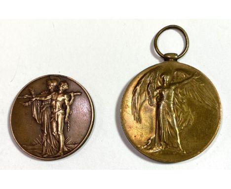 A WWI Victory medal Pte J Blaine Manch R. and an armistice medal&nbsp; 