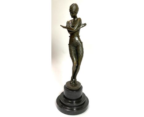 A modern Art Deco style figure:&nbsp; 1920's flapper girl, on marble base, height 38cm 