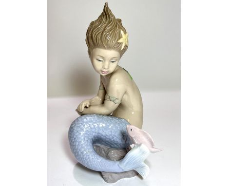 A Nao figure:&nbsp; girl mermaid with fish 