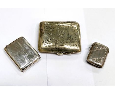 A hall marked silver cigarette case, a hall marked silver vesta case and a plated cigarette cases, 1.6oz 