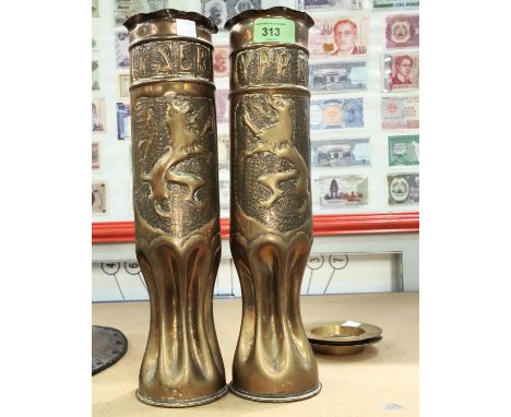 A pair of WWII period trench art shells in the form of vases with pinched bases, embossed lion shield Ypres + 2 small decorat