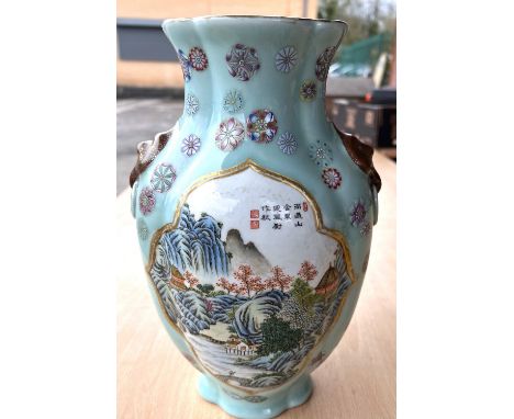 A Chinese pale green, glazed, shaped vase with polychrome coloured panel to each side, with mountain scene and text, seal mar