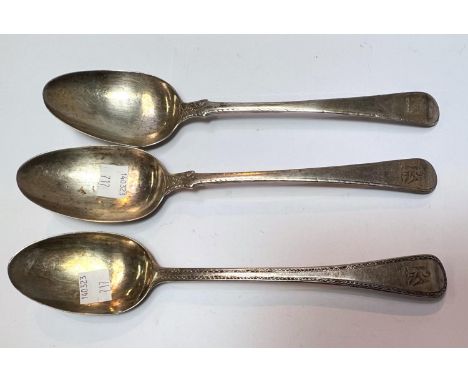 A pair of 18th century crested hallmarked silver tablespoon, Liverpool 1773 and a similar spoon 5.5oz 