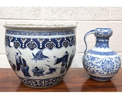 A large Chinese blue, white and red planter, height 25cm, diameter 31 cm (staple restoration) and a Chinese vase (missing han