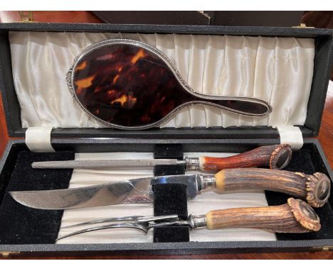 A cased Horn handle three piece carving set; a hall mark silver and tortoise shell backed hand mirror (marks worn) 