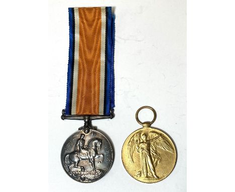 A WWI pair of medals awarded to 47160 P.T.E W. Crabtree Welsh R. and a SIlver war badge (please note the Silver War Badge has