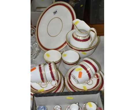 A TWENTY ONE PIECE COPELAND TEA SET AND A COLLECTION OF MINIATURE CERAMICS ETC, having a red border and gilt decoration, comp