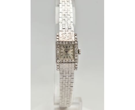 A LADYS 18CT WHITE GOLD, DIAMOND SET 'ROLEX' WRISTWATCH, manual wind, round silver dial signed 'Rolex Precision', Rolex emble