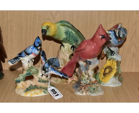 FOUR BESWICK FIGURES OF BIRDS, comprising American Blue Jays, model no. 925, Cardinal, model no. 927, Chickadee, model no. 92