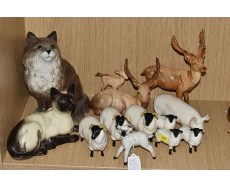 THIRTEEN BESWICK ANIMAL FIGURES, all gloss, comprising Stag lying, model no. 954, Stag standing, model no. 981, Fawn, 2nd ver