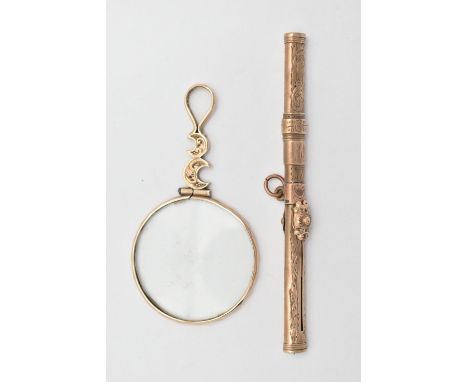 A YELLOW METAL DOUBLE ENDED PROPELLING PENCIL AND AN EYE GLASS, floral detailed yellow metal double ended propelling pencil, 