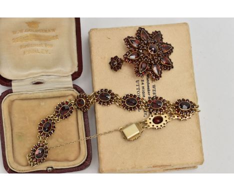 A BOHEMIAN GARNET BROOCH/PENDANT AND A BRACELET, the flower pendant set with circular cut and pear cut garnets, gilt metal mo